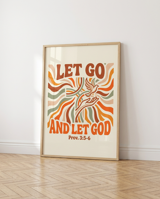 Framed poster with 'Let Go and Let God' text on a white wall.